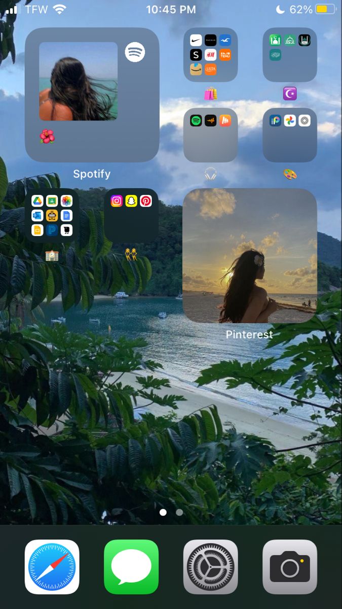 an iphone screen with the image of a woman and trees in front of her, which is