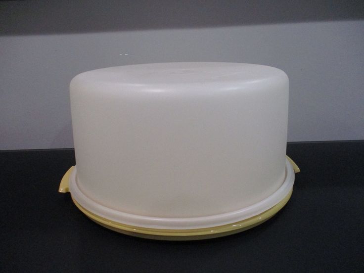 a white cake sitting on top of a black table