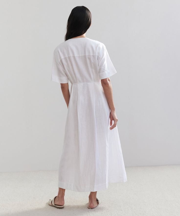 Day Dress WhiteIn soft linen with a lived-in feel, the Day Dress brings a vintage-inspired refinement to your most casual days.100% linen.Made in China. Classic Linen Dress For Daywear, Classic Summer Linen Day Dress, Classic Linen Summer Dress For Daywear, Classic Linen Dress For Summer Daywear, Classic Summer Daywear Linen Dress, Classic Fitted Linen Dress For Daywear, Elegant Linen Dress For Daywear, Elegant Spring Ramie Dresses, Classic Linen Dress For Spring Daywear