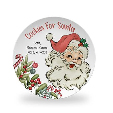 a cookie for santa plate on a white background