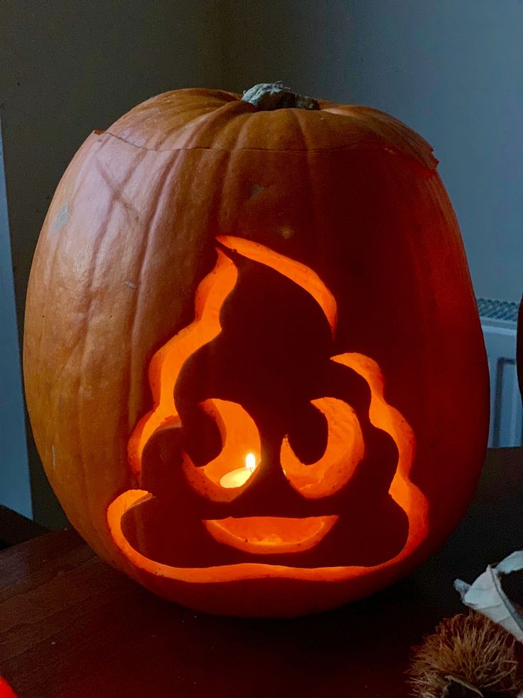 a carved pumpkin sitting on top of a table