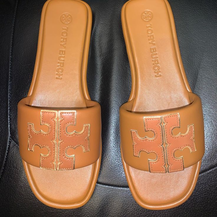 Authentic Brand New Never Worn Nappa Leather Comfortable Style Color: Aged Camello/Gold (Wired) Designer Brown Slides, Tan Open Toe Slides With Removable Insole, Tan Leather Open Toe Slides, Tan Slip-on Sandals With Branded Insole, Tan Flat Sandals With Leather Footbed, Tan Sandals With Leather Footbed And Flat Heel, Flat Tan Sandals With Leather Footbed, Tan Flat Heel Sandals With Leather Footbed, Designer Closed Toe Tan Sandals