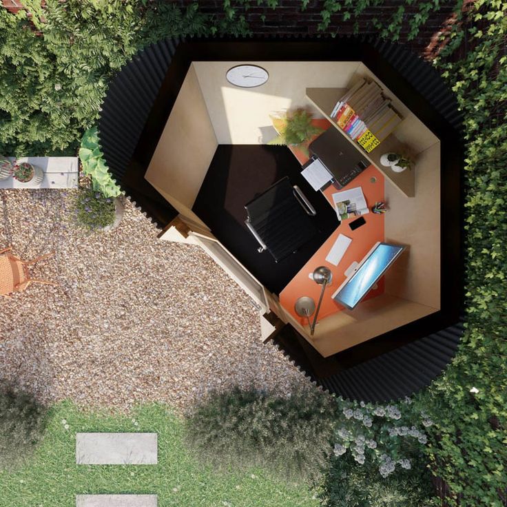 an aerial view of a small backyard office