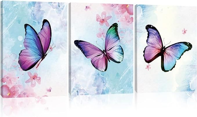 three paintings of butterflies on a blue and pink background