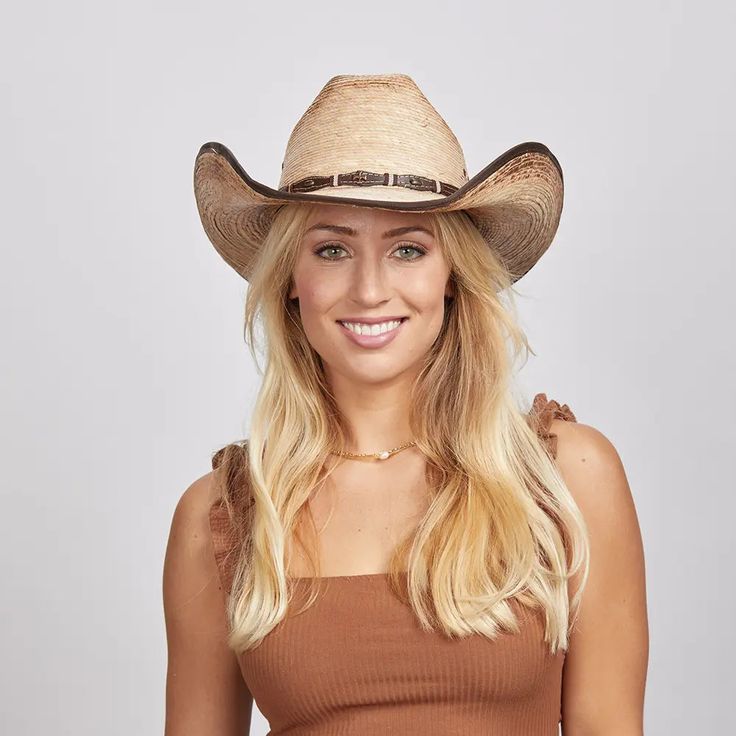 Lucas | Womens Mexican Palm Cowgirl Hat is crafted for durability and timeless Western appeal. Featuring a 4 1/4" brim and faux leather trim with conchos and eyelet details, this hat brings both style and practicality. The elastic sweatband ensures a secure and comfortable fit, perfect for all-day wear. Material: Midweight Firm Mexican Palm Shape: Cowboy Trim: Faux Leather Band with Conchos Brim Size: 4 1/4” Crown Height: 4 1/2” Features: Three Metal Eyelets for Ventilation Sweatband: Elastic Sw Womens Straw Cowboy Hat, Mexican Palm, Straw Cowgirl Hat, Luis Guzman, American Hat Makers, Straw Cowboy Hat, Cowgirl Hat, Hat Collection, Cowgirl Hats