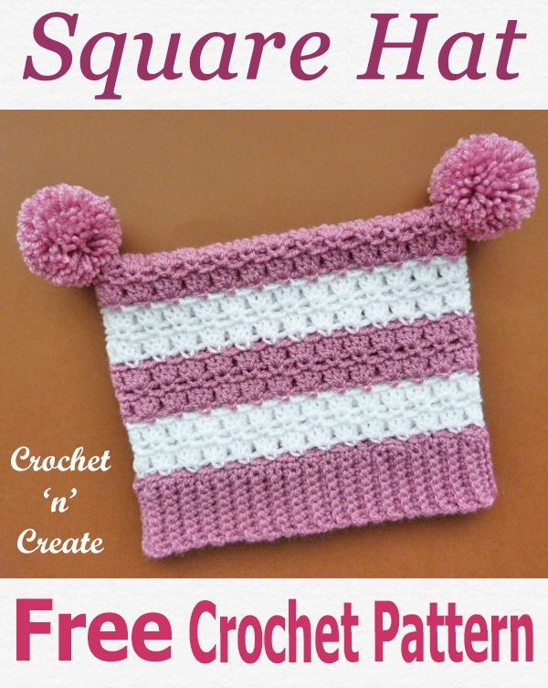 a crochet square hat with pom - poms on top