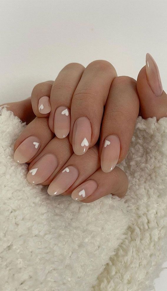 2. White Heart Natural Looking Nails Last year, many of us didn't celebrate Valentine's day at all. With Valentine's Day coming up, if you have someone you're hoping to celebrate with this year while you’re planning an epic Valentine’s Day ideas to celebrate your love, you will need to look... Ongles Beiges, February Nails, Her Nails, Oval Nails, Neutral Nails, Fashion Enthusiast, Nature Tattoos, Heart Nails, Classy Nails