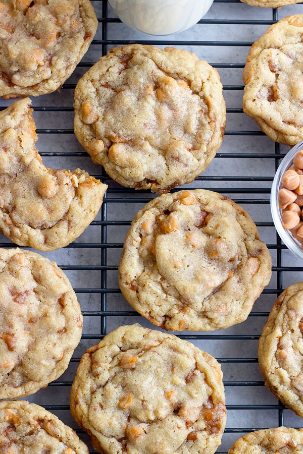 cookies and nuts are arranged on a cooling rack