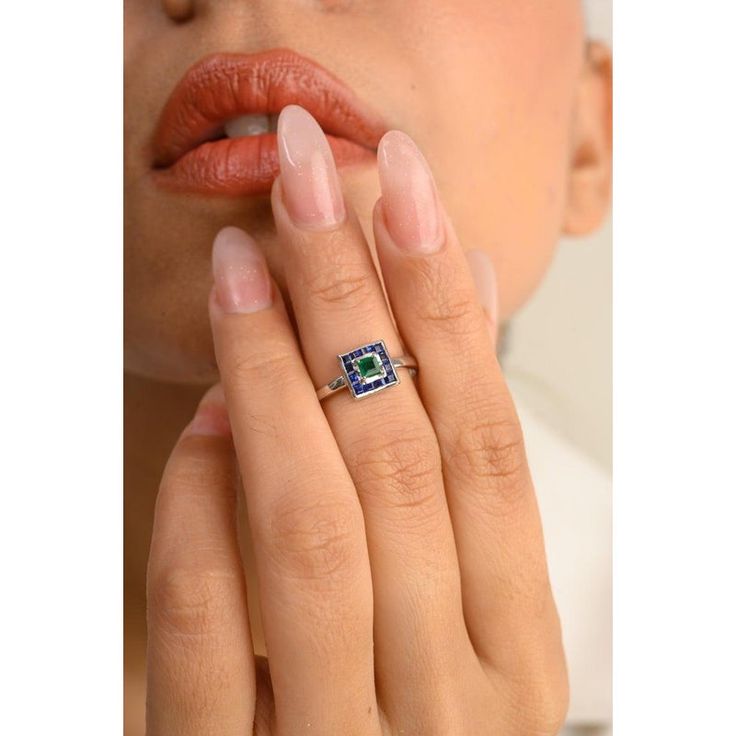 This is part of Chairish’s Fine Jewelry assortment.  Art Deco Blue Sapphire Emerald Square Shape Ring in 14K Gold featuring natural blue sapphire and emerald of 0.59 carats. The gorgeous handcrafted ring goes with every style. Sapphire stimulates concentration and reduces stress and emerald enhances the intellectual capacity. Designed with square cut blue sapphire and emerald making a square that makes it a perfect fit to wear it on your occasion or style it with any of your basic outfit to give it a glam. This is a perfect Handmade Jewelry, Bridal Shower Gift, Valentine Gift, Gift For Sister, Mother Daughter Gift, Bride To Be Gift, Bridesmaid Gift, Mom Gift, BFF Gift, Best Friend Gift, Anniversary Present, Wife Gift, Gift for Her or any Holiday Gift for Mother, Sister, Daughter, Grandma, Blue Sapphire Ring With Asscher Cut And Accent Stones, Blue Sapphire Ring Gia Certified For Promise, Gia Certified Blue Topaz Ring As Gift, Fine Jewelry Blue Sapphire Ring Birthstone, Blue Sapphire Ring Birthstone Fine Jewelry, Fine Jewelry Blue Sapphire Birthstone Ring, Blue Sapphire Emerald Cut Promise Ring, Blue Emerald Rings With Halo Setting, Gia Certified Blue Jewelry For Gift