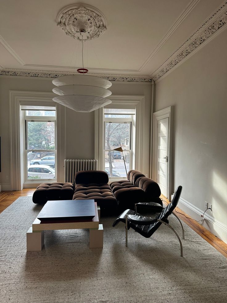 a living room with two couches and a coffee table