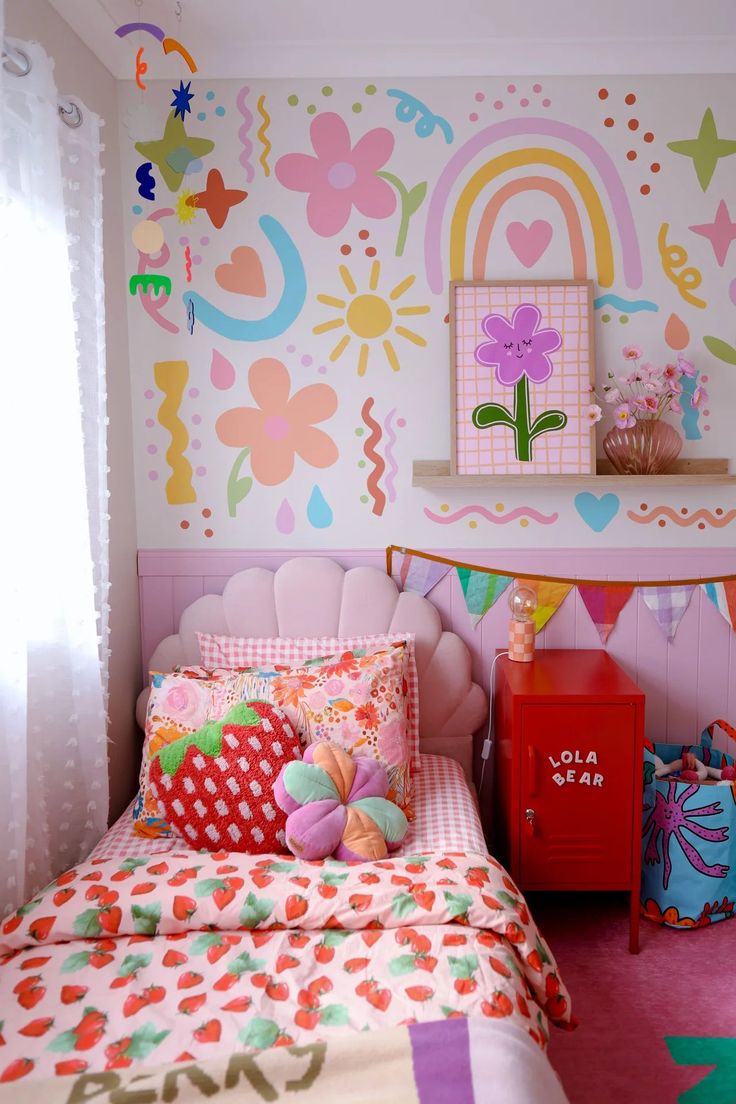 a child's bedroom decorated in bright colors