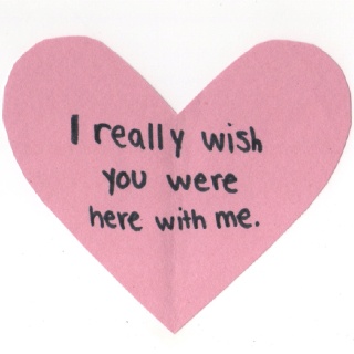 a pink heart with the words i really wish you were here with me written on it