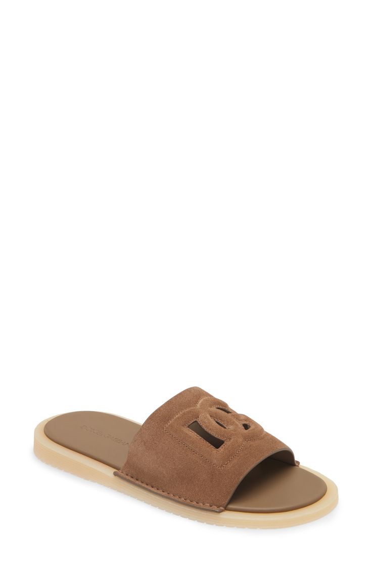 An interlocking logo is tastefully stitched into the wide strap of a laid-back slide sandal fashioned from supple Italian suede topping a ridged rubber sole. Leather upper, lining and sole Made in Italy Designer Shoes Designer Brown Slides With Cushioned Footbed, Luxury Brown Slide Sandals, Designer Brown Slides With Leather Footbed, Classic Open Toe Suede Mules, Brown Suede Slides With Rubber Sole, Luxury Suede Mules For Summer, Classic Open Toe Suede Sandals, Brown Open Toe Slides With Suede Lining, Brown Suede Open Toe Slides