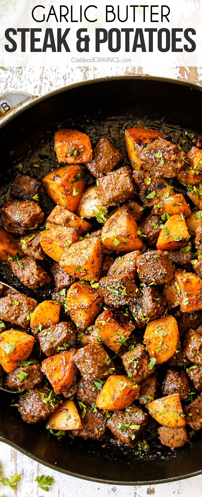 garlic butter steak and potatoes in a skillet