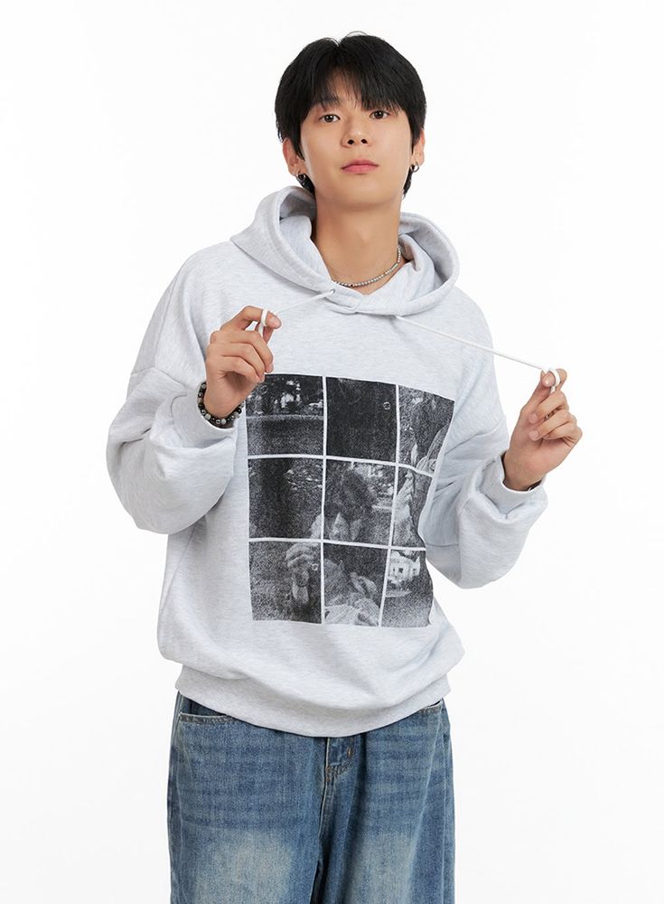 Product Detail Style : Casual Occasion : Back to school Type : Men, Sweat Detail : Hood Print : Graphic Material : Cotton Sleeve : Long sleeve Neck : Hood Fit : Loose fit Cotton100 Color : Light gray, Black Made in Korea Model Size Model is wearing size M/L and the color Light gray. Height : 6'0" | 184cm / Top : L / Bottom : XL (32 inch) .prddescription table, .prddescription td, .prddescription th { border : 1px solid black; border-collapse : collapse; padding: 10px; } Size(Inch) Size Shoulder Casual Graphic Print Hoodie, Casual Gray Sweater For Streetwear, Gray Crew Neck Casual Hoodie, Hip Hop Gray Sweatshirt For Fall, Casual Gray Crew Neck Hoodie, Casual Hoodie Sweater For Streetwear, Casual College Hoodie Sweater, Casual Streetwear Sweater With Pockets, Gray Hoodie Sweater For Streetwear