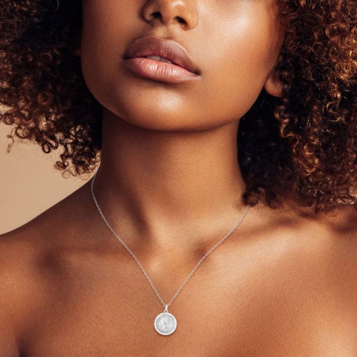 Elevate your look with the eye-catching beauty of this Sunkissed Sterling 14k Gold-Over-Silver Cubic Zirconia Coin Necklace. Click on this JEWELRY & WATCHES GUIDE to learn about fit, styles, materials and more! FEATURES Pendant dimensions: 0.55 in. x 0.55 in. Chain length: 16 in. + 2-in. extender Chain type: link Clasp: spring-ring Nickel free Metal: sterling silver Plating: rhodium & 14k gold Finish: polished Packaging: pouchSTONE DETAILS Stone type: cubic zirconia Center stone size: 1mm x 1mm Si Clarity Round Diamond Necklace Gift, Round Si Clarity Diamond Necklace Gift, Silver Diamond Necklace Si Clarity Gift, Silver Diamond Necklace Si Clarity As Gift, Silver Diamond Necklace With Si Clarity As Gift, Sterling Silver Round Diamond Necklace, Silver Charm Necklace With Diamond Accents And Round Pendant, Round White Gold Charm Necklaces With Diamond Accents, White Gold Round Charm Necklaces With Diamond Accents