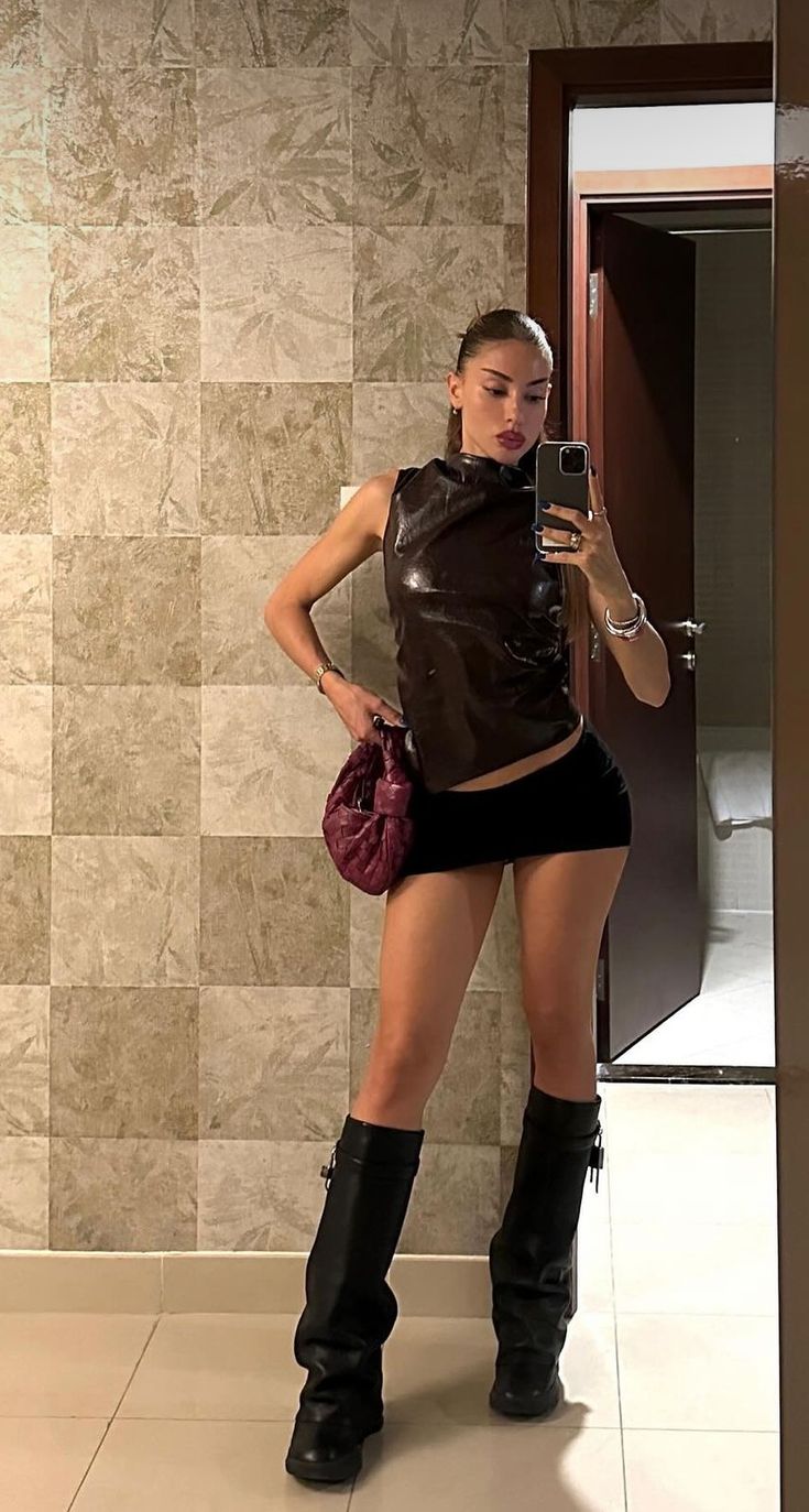 Jeffrey Campbell Boots Outfit, Brown Leather Corset Outfit, Micro Shorts Outfit Women, Stockings Outfit Summer, Kaytranada Concert Outfit, Platform Boots Outfit Aesthetic, Assymetrical Top Outfits, Classy Concert Outfit, Combat Boots Outfit For Women