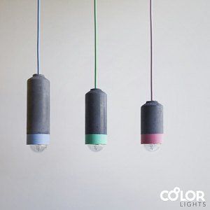 three different colored lights hanging from the ceiling