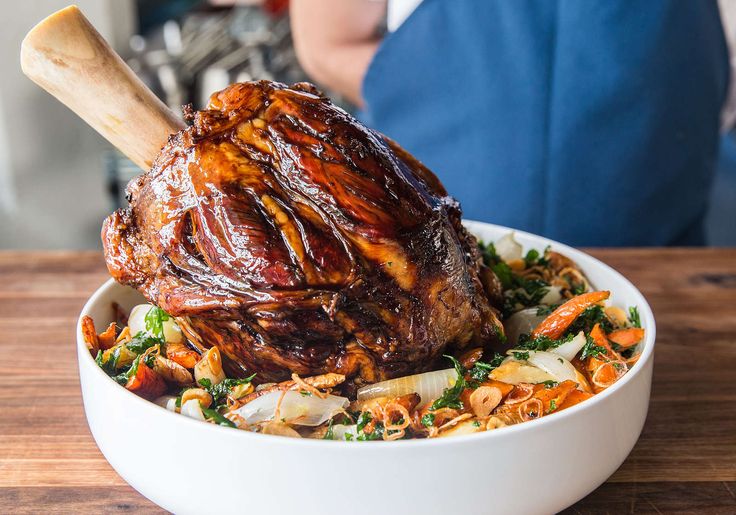 a large piece of meat sitting in a bowl