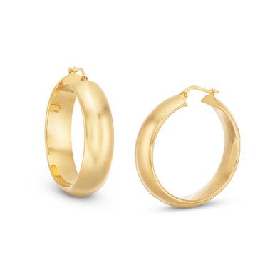 A classic take with modern flair, our Round High Polished Hoop Earrings can make a statement with any ensemble. The 7 millimeter wide hoops are versatile and perfect for any occasion. Modern Hoop Earrings For Wedding, Elegant Rounded Tarnish Resistant Earrings, Modern Tarnish-resistant Hoop Earrings For Wedding, Elegant Rounded Polished Earrings, Modern Small Hoop Earrings For Wedding, Timeless Hoop Earrings For Anniversary, Modern Wedding Hoop Earrings With Polished Finish, Elegant Hoop Earrings With Shiny Finish, Formal Hoop Earrings With Shiny Finish