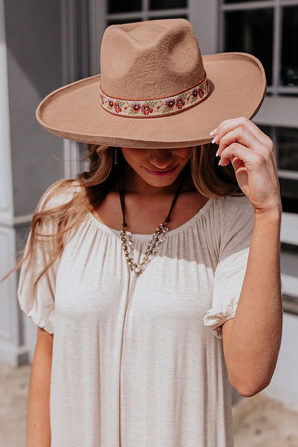 Our pretty taupe hued 'Girlfriend Status' fedora featuring lightweight wool material, a curved 4-inch brim, and a floral embroidered accent band! Hat Dimensions: Length - 15.5 Inches Width - 14 Inches Height - 4.5 Inches Cranial Circumference - 22 Inches Bohemian Beige Hat For Spring, Brimmed Fedora For Spring Festival, Country Style Brimmed Fedora For Spring, Casual Felt Hat For Rodeo In Spring, Casual Felt Hat For Spring Rodeo, Country Style Spring Fedora With Brim, Spring Country Style Brimmed Fedora, Bohemian Spring Fedora One Size Fits Most, Spring Bohemian Adjustable Fedora