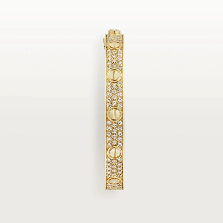 Introducing the LOVE BRACELET 6.1MM DIAMOND-PAVED, a symbol of everlasting love and elegance. This exquisite bracelet is adorned with sparkling diamonds and crafted with the finest materials, making it a luxurious addition to any jewelry collection. Perfect for special occasions or as a thoughtful gift for a loved one. ADDITIONAL INFORMATION Color: Pink Gold, Silver, Gold Stone: Diamond Ref. B6029817 Material:- 925 Sterling Silver - 18k Gold Plated- 18k Real Gold ( contact us via instagram) Widt Cartier Bangle With Single Cut Diamonds, Cartier Diamond Bracelet For Anniversary, Cartier Yellow Gold Jewelry With Diamond Accents, Cartier Bracelets With Single Cut Diamonds, Gold Cartier Jewelry In Cubic Zirconia, Cartier Round Bracelet With Single Cut Diamonds, Gold Cubic Zirconia Cartier Jewelry, Cartier Single-cut Diamond Bracelets, Cartier Bangle Bracelets With Diamond Accents