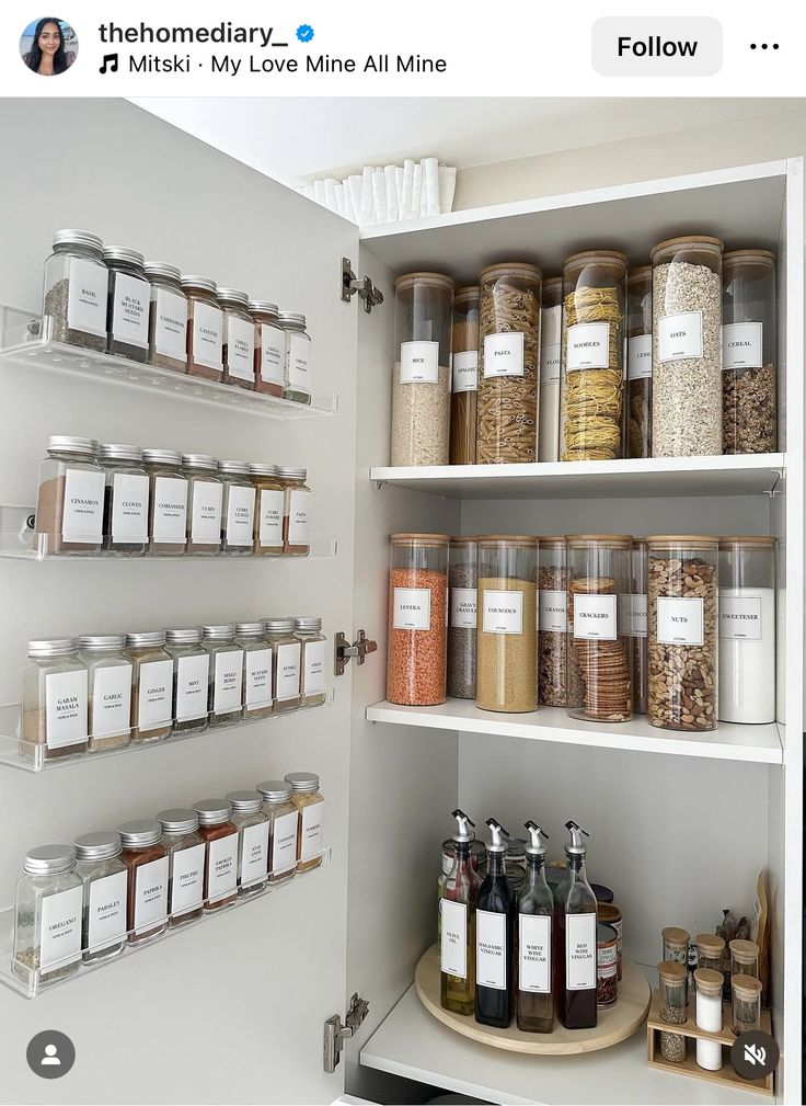 an open pantry filled with lots of different types of spices and condiments on shelves