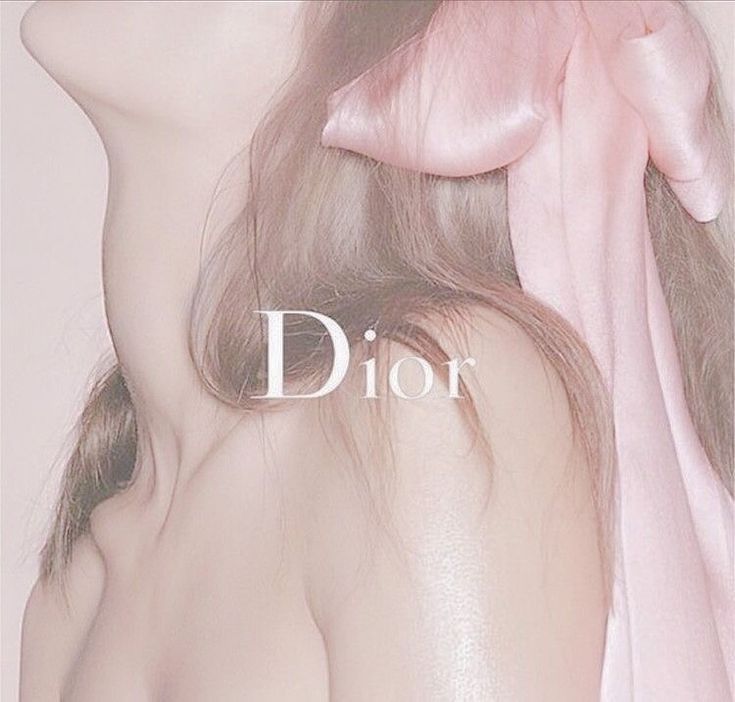 a woman with long hair wearing a pink bow around her neck and the word dior above her head