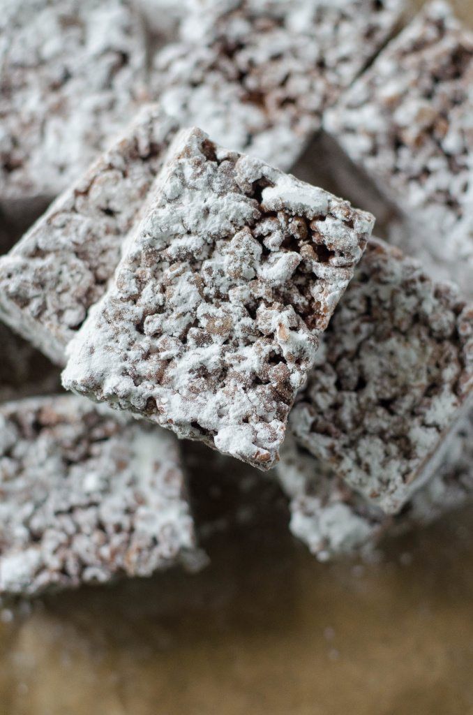 several pieces of brownie with powdered sugar on top