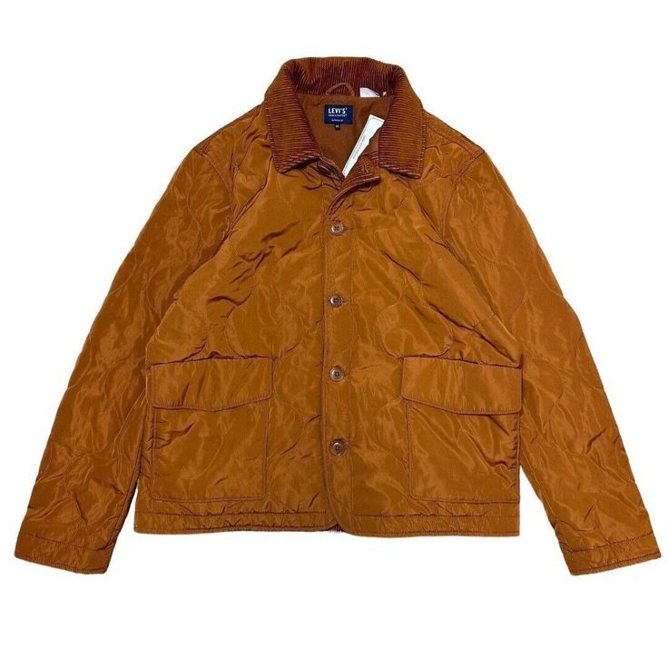 This Unique Levi's Trucker Jacket In Caramel Color Is Perfect For Any Occasion, Whether It's For Travel, Workwear, Or Casual Wear. The Outer Shell Is Made Of 100% Cotton Denim With A Quilted Accent, And It Is Lined With Polyester For Added Warmth During Winter Seasons. The Jacket Is Machine Washable And Features A Button Closure And A Regular Fit. The Plaid Pattern And Vintage Style Of This Jacket Make It A Great Addition To Any Wardrobe. It's Perfect For Those Who Love Streetwear, Western, Or E Brown Long Sleeve Outerwear With Padded Collar, Brown Collared Blazer With Patch Pockets, Classic Long Sleeve Orange Outerwear, Fitted Brown Outerwear With Padded Collar, Brown Fall Sport Coat With Patch Pockets, Brown Sport Coat With Patch Pockets For Fall, Orange Single Breasted Long Sleeve Outerwear, Orange Single-breasted Long Sleeve Outerwear, Levi's Brown Winter Outerwear