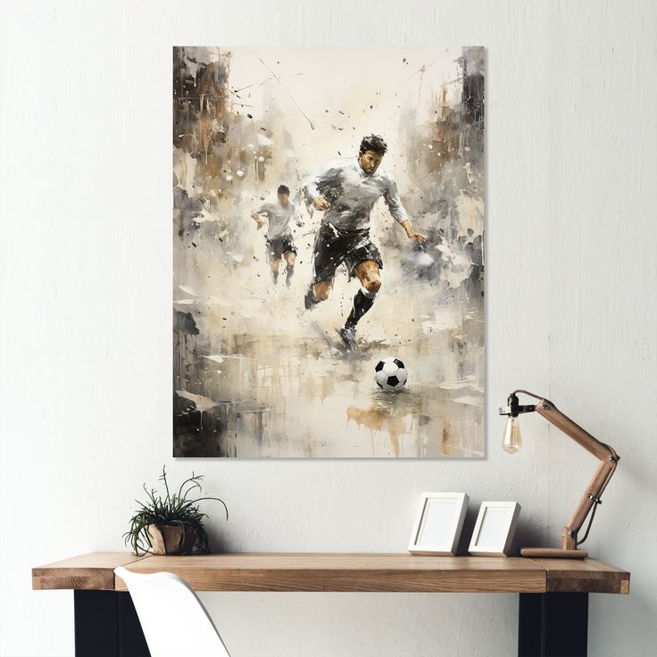 a painting of a man kicking a soccer ball on a wall next to a desk