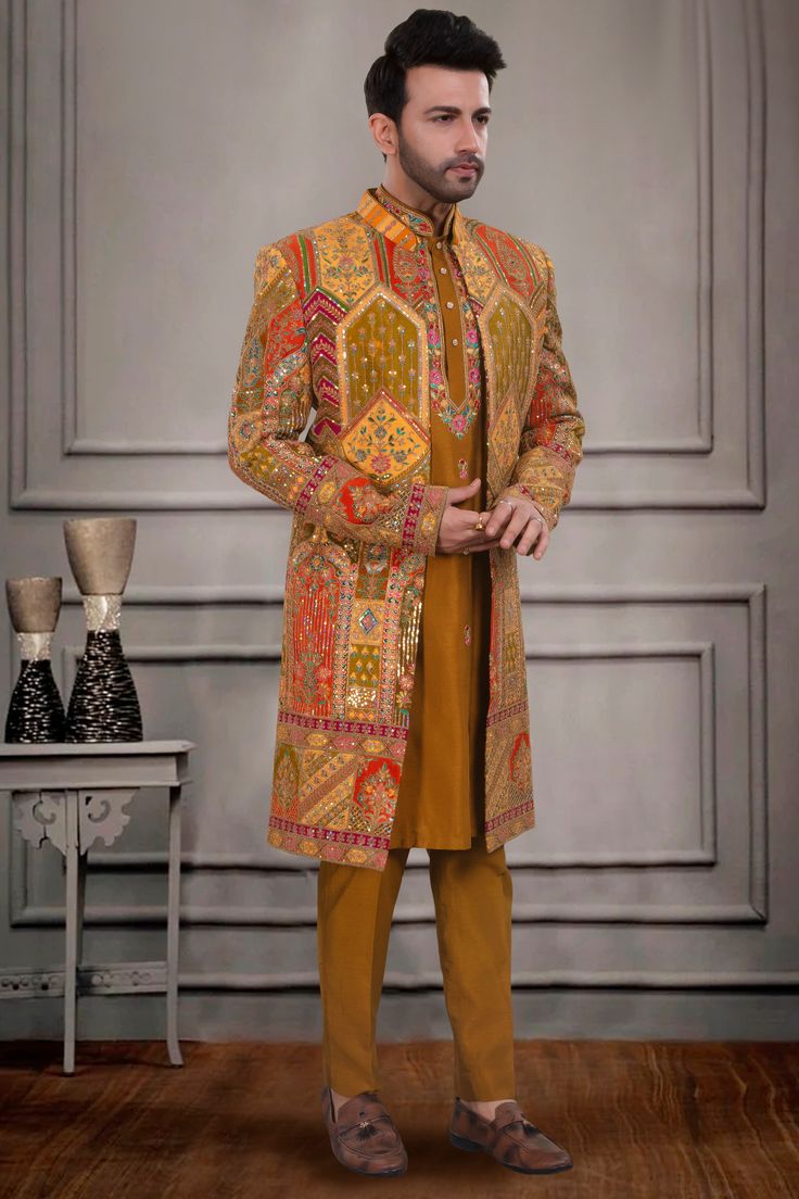 Get ready to steal the show with our Mens Sherwani- S10-S07! This multi-colored open jacket sherwani is the perfect blend of traditional and modern styles. You'll be turning heads with its unique and vibrant design - definitely a vibe! Festive Long Sleeve Traditional Fit Sherwani, Bollywood Style Sherwani With Dabka In Traditional Fit, Bollywood Style Sherwani With Long Sleeves, Designer Nehru Jacket For Festivals, Long Sleeve Traditional Wear With Naqshi For Transitional Season, Designer Traditional Wear For Winter Festive Season, Multicolor Designer Nehru Jacket For Eid, Designer Traditional Wear For Festive Winter Season, Designer Long Sleeve Sherwani For Festivals