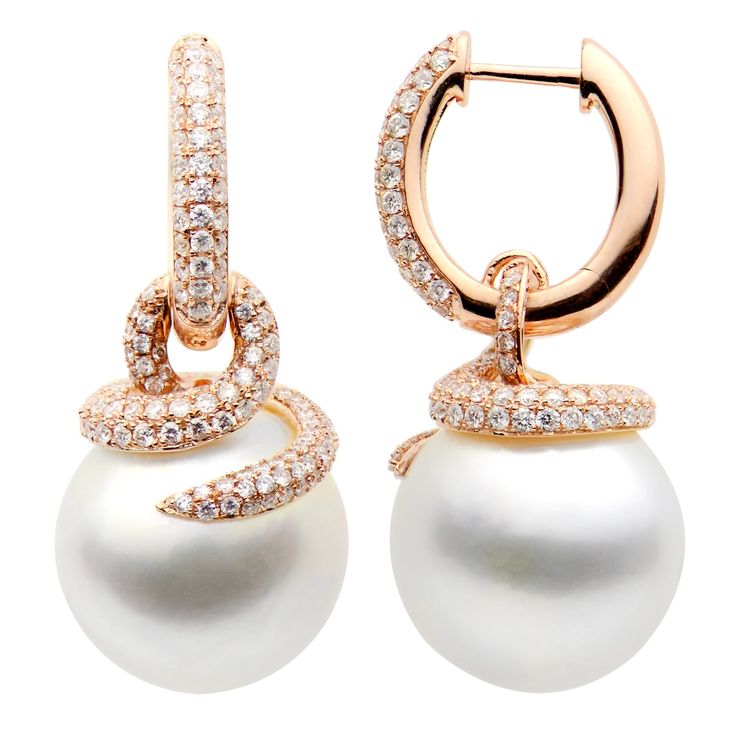 18k rose gold diamond and South Sea Pearl earrings with 312 round brilliant cut diamonds weighing 1.54 carats of F color, VS2 clarity, and of excellent cut and brilliance. Earrings also feature 2 South Sea Pearls measuring 14-15mm. This item is currently out of stock. Please allow 4-6 weeks for delivery. Please note this item is a special order and non-refundable. Due to fluctuation in gold and diamonds prices are subject to change. Pink Diamond Band, Diamond And Pearl Earrings, Sapphire Eternity Band, South Sea Pearls Earrings, Pearl And Diamond Necklace, Sea Pearl, Sea Pearls, South Sea Pearls, Diamond Hoop Earrings