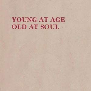 an old book with the title young at age old at soul written in red on it