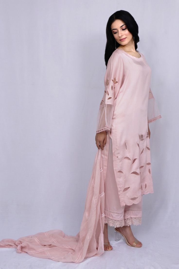 Pastel pink kurta with floral cutwork and sheer sleeve hem detailing. Paired with tonal pant and kota dupatta.
Component: 3
Type Of Work: Floral
Neckline: Round
Sleeve Type: Full sleeves
Fabric: Modal Satin, Kota, Organza
Color: Pink
Other Details: 
Sheer sleeve hem
Nalki work or neckline
Scallop hem on kurta
Occasion: Puja - Aza Fashions Floral Cutwork, Pink Kurta, Kurta Set For Women, Scallop Hem, Kurta Set, Full Sleeves, Scalloped Hem, Cut Work, Sheer Sleeves