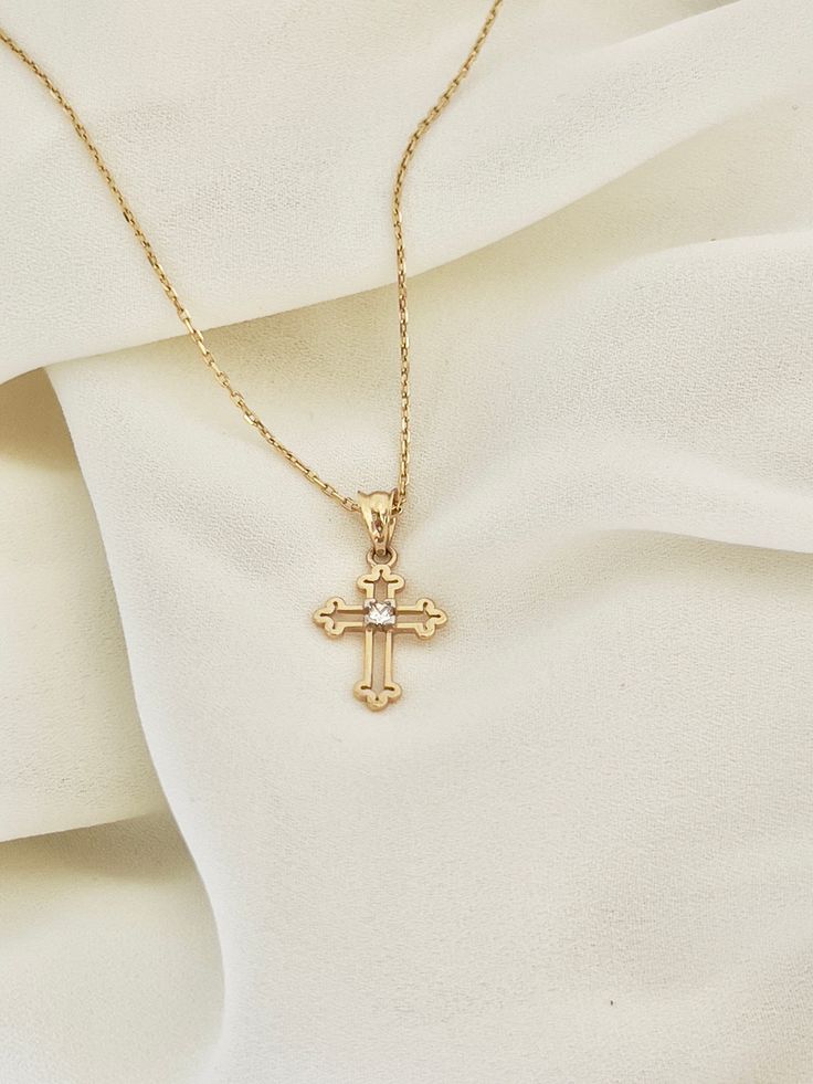 "This is a 14k yellow solid gold (not filled or plated) hollow cross necklace furnished with a tiny shiny cubic zirconia diamond. The necklace is easy to wear alone or layered with something else. This also makes the perfect gift. - 14K SOLID GOLD - WEIGHT: 2.10 gr - Necklace LENGTH: 19 3/4\" - PENDANT LENGTH: 7/8\" Each item comes in a beautiful gift box. HOW TO CARE FOR YOUR JEWELRY: + Unlike any gold-filled, plated, or vermeil jewelry that is not solid gold, wet areas, perfumes, and lotions w Gold Jewelry Men, Jewelry Photography Tutorial, Real Gold Jewelry, Gold Cross Pendant, Jewelry Men, Vermeil Jewelry, Women Necklace, Necklace Women, Birthday Gifts For Girlfriend