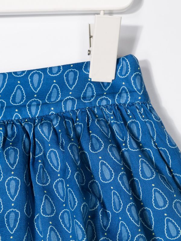 Shop Knot ruffle detail skirt with Express Delivery - FARFETCH Skirted Blue Bottoms With Ruffles, Blue Skirted Bottoms With Ruffles, Summer Blue Bottoms With Pleated Hem, Blue Pleated Hem Bottoms For Summer, Cotton Long Skirt With Pleated Hem, Blue Pleated Hem Skirt For Summer, Blue Full Skirt With Elastic Waistband, Blue Skirted Bottoms With Pleated Hem, Full Cotton Skirt With Ruffles