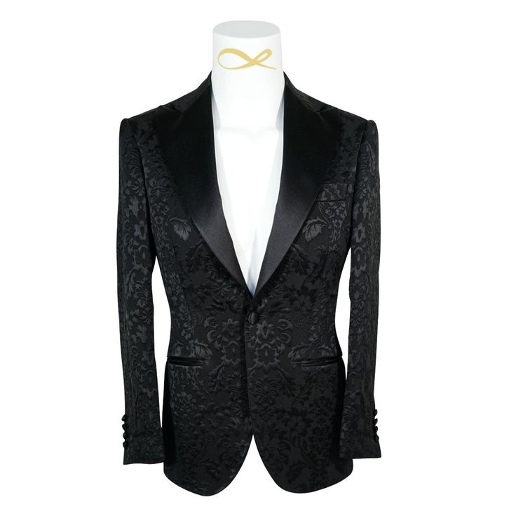 Black Designer Fiore Fabric Woven In France Satin Signature Peak Lapel Single Button Closure Soft, natural shoulder construction Chest Barchetta Pocket Dual Vents Satin covered buttons Handmade in any size! Includes a Sebastian Cruz Couture Pocket Square of your choice! All of our jackets are made with 4" extra of fabric to ensure you don't have to send it back to us if its too small or too big. You can tailor your jacket 2 sizes bigger and/or smaller if needed. We guarantee your satisfaction! F Fitted Business Blazer With Horn Royal Black Buttons, Luxury Tuxedo With Button Closure For Formal Events, Luxury Tuxedo With Button Closure For Formal Occasions, Luxury Formal Tuxedo With Button Closure, Elegant Fitted Tuxedo With Button Closure, Designer Fitted Single Breasted Tuxedo, Luxury Long Sleeve Fitted Blazer, Luxury Fitted Long Sleeve Blazer, Black Business Blazer With Covered Buttons