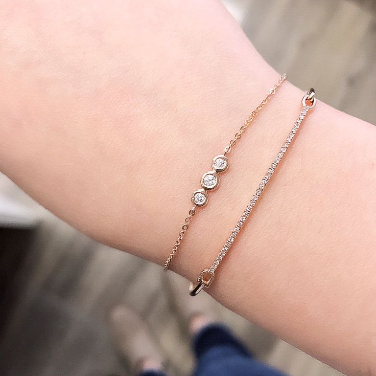 Our Diamond Bar Bangle is one of our favorites! It’s the perfect addition to your luxe stack of bangles, and looks equally elegant when worn solo. The shimmer of diamonds across the top bar is beautifully complemented by a handcrafted closure that was skillfully created for ease of wear. Diamond Bar Bracelet, Diamond Bar, Bar Top, Unique Diamonds, Bar Bracelets, Gold Bangle, Conflict Free Diamonds, Gold Bangles, Delicate Bracelet