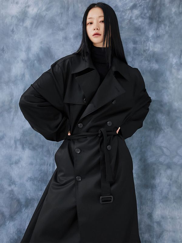 Editor's NotesFLARE UP’s trench coat features water-proof, silky fabric and oversized fit.- Button closure- Long sleeves- Button detail at cuffs- Oversized fit- Silky, water-proof fabric- Belt detail around waist- Side pocketsMeasurements(in.)0 / 1 / 2- Shoulder: 19.7in. / 19.9in. / 20.5in.- Sleeve: 24.4in. / 25.0in. / 25.6in.- Chest: 24.0in. / 24.8in. / 25.6in.- Length: 44.9in. / 46.1in. / 46.9in.*Model Info(Men): 6’2’’ Fitting Size 1,2*Model Info(Women): 5’9’’ Fitting Size 2*Model Info(Women): Oversized Double-breasted Outerwear With Belted Cuffs, Classic Oversized Outerwear With Belted Cuffs, Oversized Outerwear With Belted Cuffs For Work, Oversized Business Outerwear With Button Cuffs, Oversized Long Coat With Belted Cuffs, Oversized Outerwear For Rainy Weather, Oversized Belted Gabardine Outerwear, All Black Outfit Men, Fits Inspiration