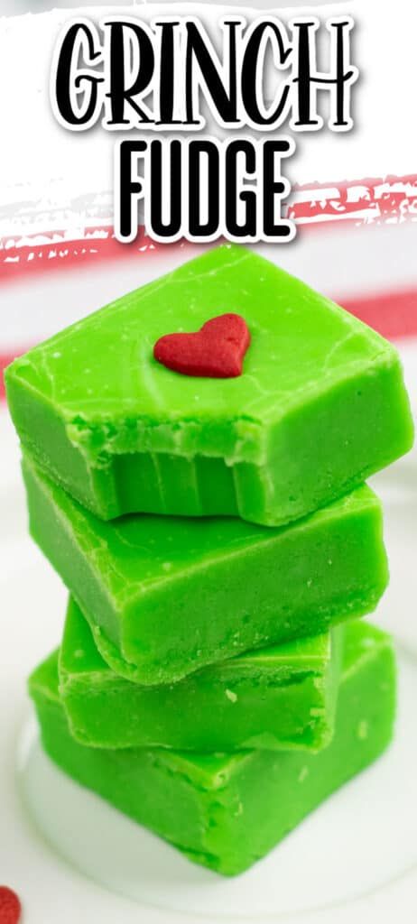 three pieces of green fudge sitting on top of a white plate with a red heart