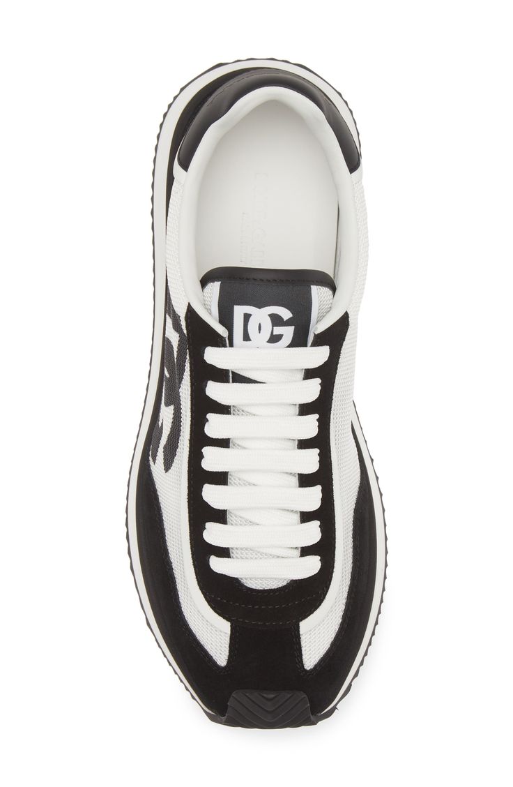 The iconic interlocking D&G logo emblazons the mesh paneling of this futuristic sneaker crafted from rich suede and featuring plush cushioning. Lace-up style Textile and leather upper and lining/synthetic sole Made in Italy Designer Shoes Lace-up Mesh Sneakers With Logo, Sports Sneakers With Logo Print And Mesh Material, Sports Mesh Sneakers With Logo Print, Lace-up Mesh Sneakers With Logo Print, Mesh Lace-up Sneakers With Logo Print, Sporty Mesh Sneakers With Logo Print, Mesh Sports Sneakers With Logo, Luxury Sports Sneakers With Logo Detail, Luxury Logo Sneakers For Sports