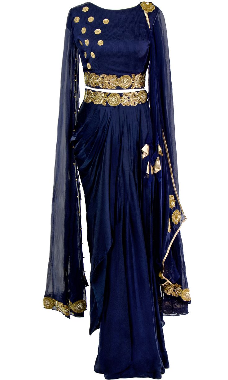 Saree is pre-stitched Saree is pre-pleated Saree is pre-made Stunning navy blue saree that has a pleated maxi skirt with floral motif work paired with cape-style cropped blouse. This set comes with sequin embellished drape! The fabric is modal satin and georgette. Navy Blue Saree, Mens Indian Wear, Pleated Saree, Stitched Saree, Western Wear Dresses, Cape Style, Blue Saree, Cropped Blouse, Pleated Maxi Skirt