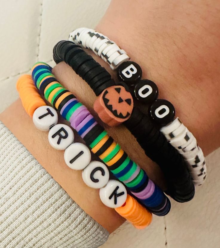 four different bracelets that say trick or treat