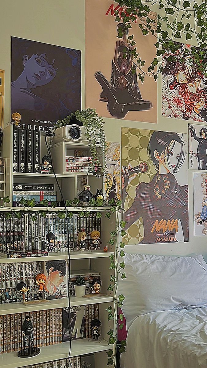 a bedroom with bookshelves and posters on the wall