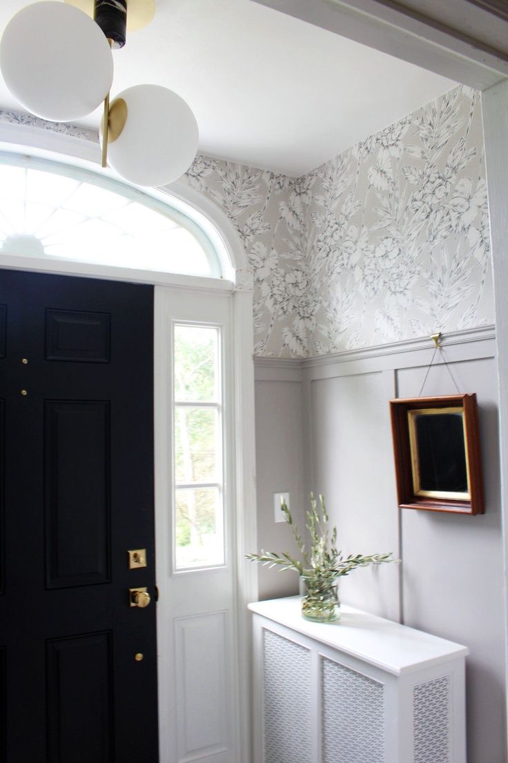 a black and white door in a room