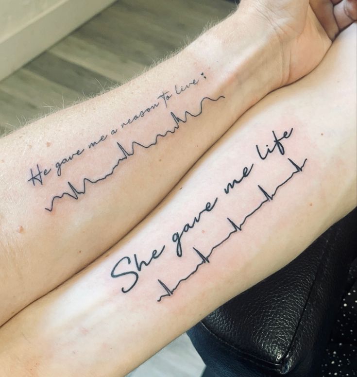 two people with tattoos on their arms that say, you are meant to be married