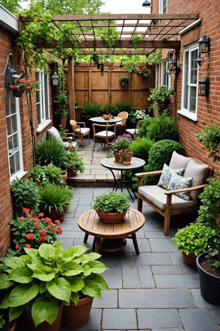 an outdoor patio with potted plants and chairs