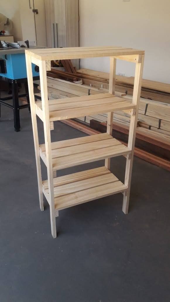 the shelves are made out of wood and ready to be put in place for display