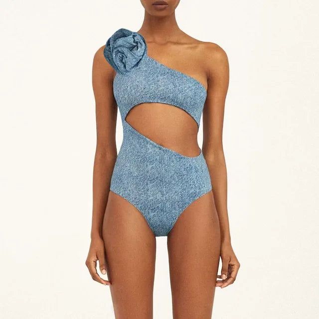 Dive into style with our denim-inspired one-piece swimsuits, complete with a matching cover-up, sarong, or wide-leg pants. This versatile set is perfect for making waves at the beach or lounging poolside. Available in various styles to suit your unique fashion sense. Chic Swimwear For Poolside Vacation, Chic Swimwear For Beach Season Poolside, Chic Swimwear For Poolside Resort Season, Chic Swimwear For Resort Season Poolside, Fitted Beachwear Swimwear For Warm Weather, Chic Summer Swimwear For Poolside, Chic Resort Season Swimwear For Pool, One-piece Swimwear For Poolside Resort Season, Chic Stretch Swimwear For Summer